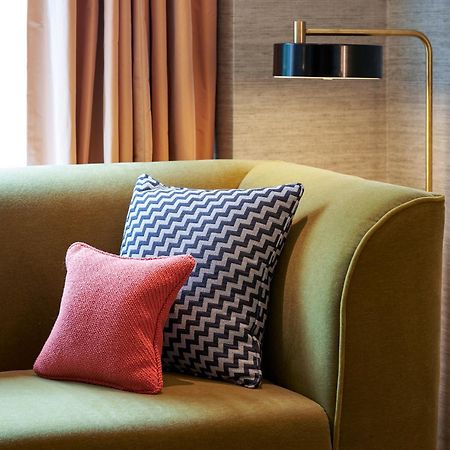 The Fitzwilliam Hotel Dublin Exterior photo A sofa with cushions