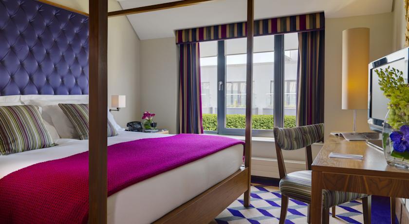 The Fitzwilliam Hotel Dublin Exterior photo A bedroom at the hotel