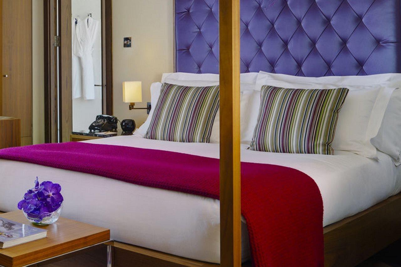 The Fitzwilliam Hotel Dublin Exterior photo A bedroom at the hotel